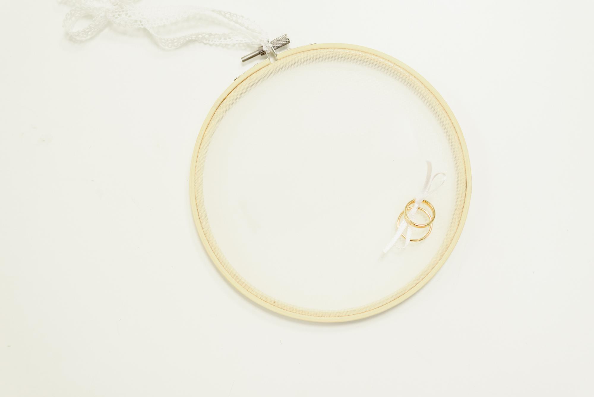 A luxury hand embroidery hoop with gold threads